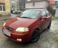 Красный Шевроле Авео, объемом двигателя 1.5 л и пробегом 250 тыс. км за 2200 $, фото 1 на Automoto.ua