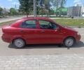 Красный Шевроле Авео, объемом двигателя 1.5 л и пробегом 222 тыс. км за 3000 $, фото 1 на Automoto.ua
