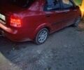 Красный Шевроле Авео, объемом двигателя 1 л и пробегом 240 тыс. км за 2708 $, фото 1 на Automoto.ua