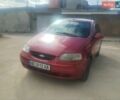 Красный Шевроле Авео, объемом двигателя 1.5 л и пробегом 60 тыс. км за 1550 $, фото 1 на Automoto.ua