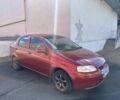 Красный Шевроле Авео, объемом двигателя 1.5 л и пробегом 250 тыс. км за 1999 $, фото 1 на Automoto.ua