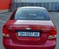 Красный Шевроле Авео, объемом двигателя 1.5 л и пробегом 150 тыс. км за 3750 $, фото 5 на Automoto.ua