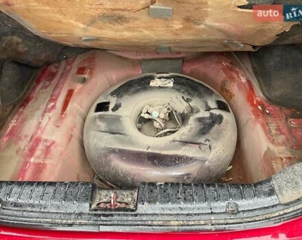 Червоний Шевроле Авео, об'ємом двигуна 1.5 л та пробігом 257 тис. км за 1699 $, фото 1 на Automoto.ua