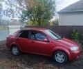 Красный Шевроле Авео, объемом двигателя 1.5 л и пробегом 290 тыс. км за 2400 $, фото 1 на Automoto.ua