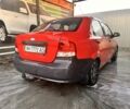Красный Шевроле Авео, объемом двигателя 1.5 л и пробегом 250 тыс. км за 1800 $, фото 3 на Automoto.ua