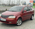 Красный Шевроле Авео, объемом двигателя 1.5 л и пробегом 218 тыс. км за 2999 $, фото 1 на Automoto.ua
