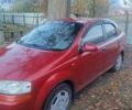 Красный Шевроле Авео, объемом двигателя 1.5 л и пробегом 290 тыс. км за 2400 $, фото 1 на Automoto.ua