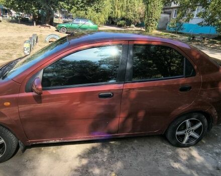 Красный Шевроле Авео, объемом двигателя 1.5 л и пробегом 225 тыс. км за 4500 $, фото 2 на Automoto.ua