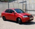 Красный Шевроле Авео, объемом двигателя 1.5 л и пробегом 230 тыс. км за 2500 $, фото 1 на Automoto.ua