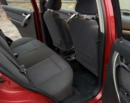 Красный Шевроле Авео, объемом двигателя 1.4 л и пробегом 169 тыс. км за 4200 $, фото 15 на Automoto.ua