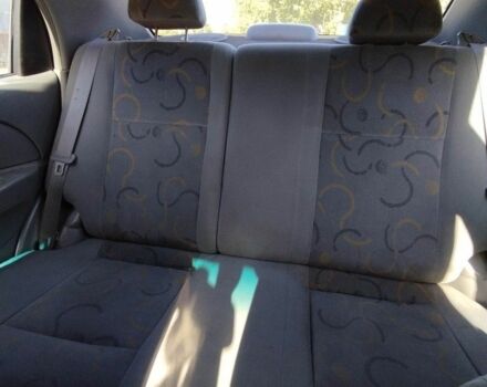 Красный Шевроле Авео, объемом двигателя 1.5 л и пробегом 350 тыс. км за 1800 $, фото 2 на Automoto.ua