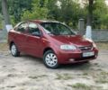 Красный Шевроле Авео, объемом двигателя 1.5 л и пробегом 250 тыс. км за 2450 $, фото 1 на Automoto.ua
