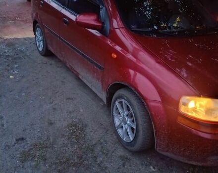 Червоний Шевроле Авео, об'ємом двигуна 2 л та пробігом 250 тис. км за 2500 $, фото 1 на Automoto.ua