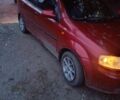 Червоний Шевроле Авео, об'ємом двигуна 2 л та пробігом 250 тис. км за 2500 $, фото 1 на Automoto.ua
