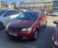 Красный Шевроле Авео, объемом двигателя 1.5 л и пробегом 220 тыс. км за 2700 $, фото 1 на Automoto.ua