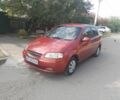 Красный Шевроле Авео, объемом двигателя 1.5 л и пробегом 270 тыс. км за 2000 $, фото 1 на Automoto.ua