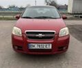 Красный Шевроле Авео, объемом двигателя 1.4 л и пробегом 169 тыс. км за 4200 $, фото 1 на Automoto.ua