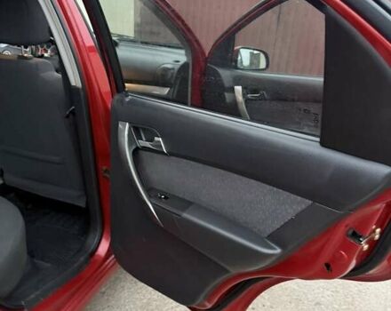 Красный Шевроле Авео, объемом двигателя 1.4 л и пробегом 169 тыс. км за 4200 $, фото 16 на Automoto.ua