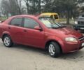 Красный Шевроле Авео, объемом двигателя 1.5 л и пробегом 265 тыс. км за 2400 $, фото 2 на Automoto.ua