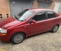 Красный Шевроле Авео, объемом двигателя 1.5 л и пробегом 224 тыс. км за 3200 $, фото 2 на Automoto.ua