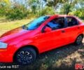 Красный Шевроле Авео, объемом двигателя 1.5 л и пробегом 318 тыс. км за 3000 $, фото 1 на Automoto.ua