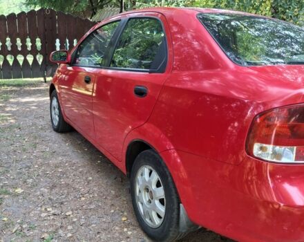 Червоний Шевроле Авео, об'ємом двигуна 1.5 л та пробігом 185 тис. км за 2400 $, фото 4 на Automoto.ua