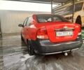 Красный Шевроле Авео, объемом двигателя 1.5 л и пробегом 250 тыс. км за 1800 $, фото 4 на Automoto.ua