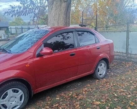 Красный Шевроле Авео, объемом двигателя 1.5 л и пробегом 290 тыс. км за 2400 $, фото 4 на Automoto.ua
