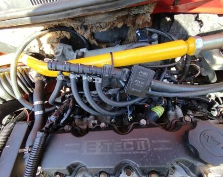 Красный Шевроле Авео, объемом двигателя 1.5 л и пробегом 350 тыс. км за 1800 $, фото 1 на Automoto.ua