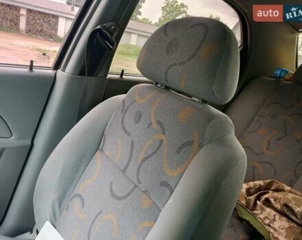 Красный Шевроле Авео, объемом двигателя 1.5 л и пробегом 320 тыс. км за 2500 $, фото 2 на Automoto.ua