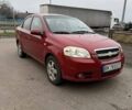 Красный Шевроле Авео, объемом двигателя 1.4 л и пробегом 169 тыс. км за 4200 $, фото 3 на Automoto.ua