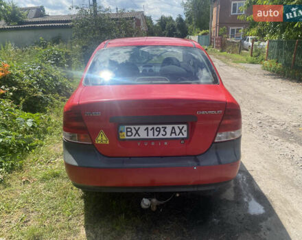 Красный Шевроле Авео, объемом двигателя 1.5 л и пробегом 255 тыс. км за 1800 $, фото 2 на Automoto.ua