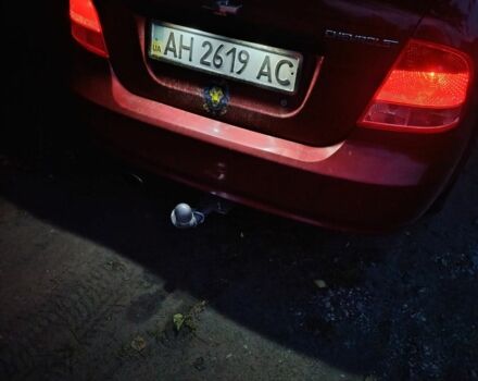 Червоний Шевроле Авео, об'ємом двигуна 2 л та пробігом 250 тис. км за 2500 $, фото 6 на Automoto.ua