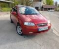 Красный Шевроле Авео, объемом двигателя 1.5 л и пробегом 300 тыс. км за 2850 $, фото 1 на Automoto.ua