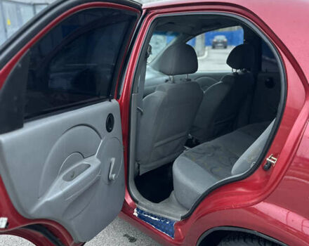 Красный Шевроле Авео, объемом двигателя 1.5 л и пробегом 268 тыс. км за 3500 $, фото 7 на Automoto.ua