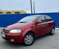 Красный Шевроле Авео, объемом двигателя 1.5 л и пробегом 268 тыс. км за 3500 $, фото 1 на Automoto.ua