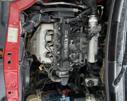 Красный Шевроле Авео, объемом двигателя 1.5 л и пробегом 224 тыс. км за 3200 $, фото 7 на Automoto.ua