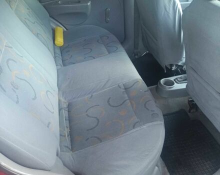 Красный Шевроле Авео, объемом двигателя 1.5 л и пробегом 290 тыс. км за 2400 $, фото 15 на Automoto.ua