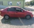 Красный Шевроле Авео, объемом двигателя 1.5 л и пробегом 314 тыс. км за 2400 $, фото 1 на Automoto.ua