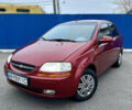 Красный Шевроле Авео, объемом двигателя 1.5 л и пробегом 268 тыс. км за 3500 $, фото 1 на Automoto.ua