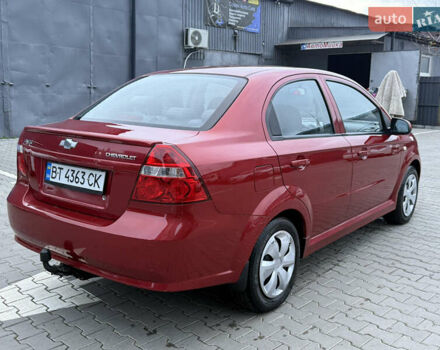 Красный Шевроле Авео, объемом двигателя 1.4 л и пробегом 180 тыс. км за 3300 $, фото 4 на Automoto.ua