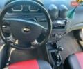 Красный Шевроле Авео, объемом двигателя 1.5 л и пробегом 210 тыс. км за 3400 $, фото 7 на Automoto.ua