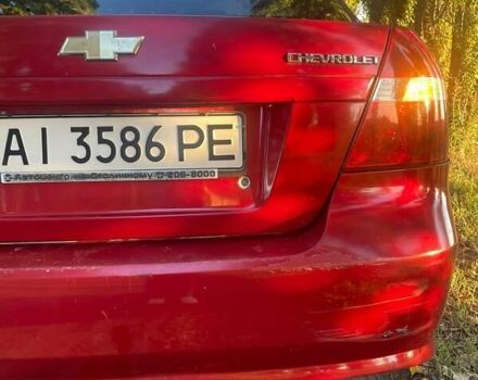 Красный Шевроле Авео, объемом двигателя 1.5 л и пробегом 210 тыс. км за 3400 $, фото 12 на Automoto.ua