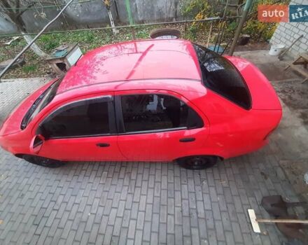 Красный Шевроле Авео, объемом двигателя 1.5 л и пробегом 196 тыс. км за 3300 $, фото 2 на Automoto.ua