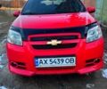 Красный Шевроле Авео, объемом двигателя 1.5 л и пробегом 330 тыс. км за 3600 $, фото 1 на Automoto.ua