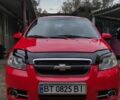 Красный Шевроле Авео, объемом двигателя 1.5 л и пробегом 200 тыс. км за 4500 $, фото 2 на Automoto.ua