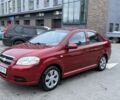 Красный Шевроле Авео, объемом двигателя 1.4 л и пробегом 180 тыс. км за 3300 $, фото 1 на Automoto.ua