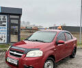 Красный Шевроле Авео, объемом двигателя 1.5 л и пробегом 107 тыс. км за 2100 $, фото 1 на Automoto.ua