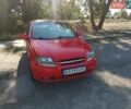 Красный Шевроле Авео, объемом двигателя 1.5 л и пробегом 500 тыс. км за 2000 $, фото 1 на Automoto.ua