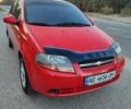 Красный Шевроле Авео, объемом двигателя 1.5 л и пробегом 190 тыс. км за 3300 $, фото 1 на Automoto.ua